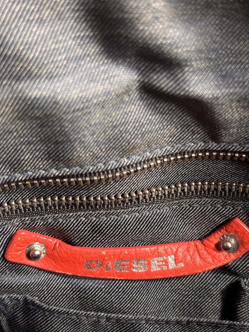 Diesel leather 2way Bag (Category: Cross-body Bags) located in Manila. Submitted by earlylifecrisis3 (Listing ID 1460505417, Image 3). Description: Condition 9/10 Measure it by inch Width: 11 Length: 9 Depth: 4.5 Handle: 4 Sling: 18.5 •Refund / Returns not allowed allowed •Please do check the dimensions size on labels sometimes are not accurate on the sizing •Ask me before purchasing.