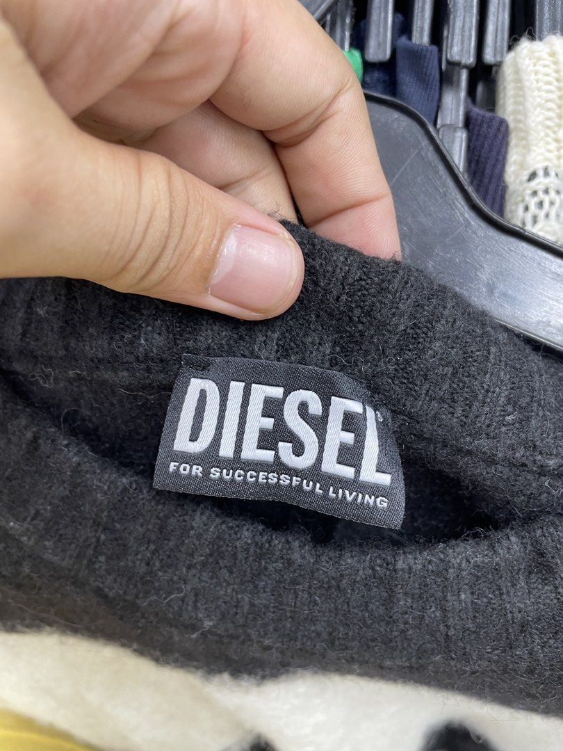 Diesel Striped Knit Sweater (Category: Coats, Jackets and Outerwear) located in Lucena. Submitted by riyizthriftz (Listing ID 1460504408, Image 3). Description: - Authentic Diesel sweater - Made in Italy - Classic black and white stripes - Tagged size S - Comfortable blend of cotton, nylon, and wool - Cozy and stylish, ideal for cooler weather.
