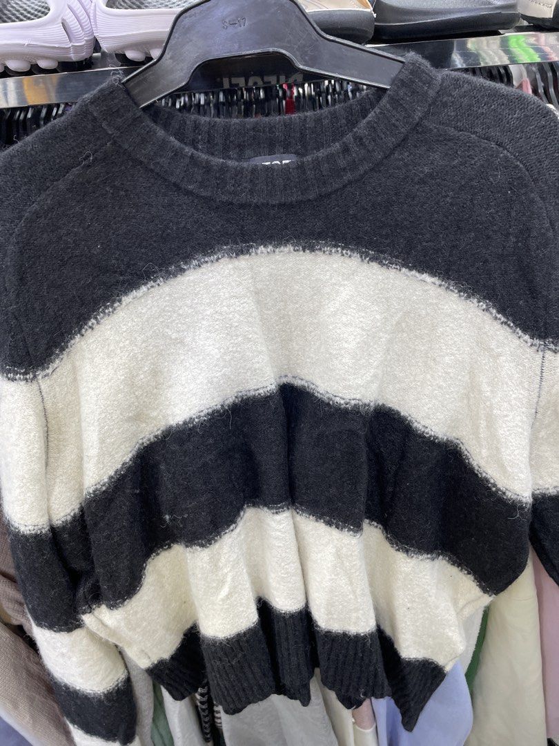 Diesel Striped Knit Sweater (Category: Coats, Jackets and Outerwear) located in Lucena. Submitted by riyizthriftz (Listing ID 1460504408, Image 2). Description: - Authentic Diesel sweater - Made in Italy - Classic black and white stripes - Tagged size S - Comfortable blend of cotton, nylon, and wool - Cozy and stylish, ideal for cooler weather.