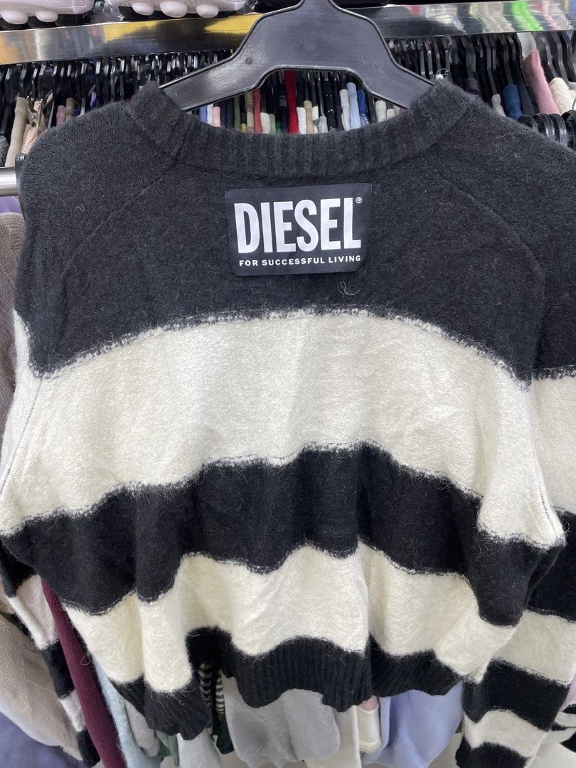 Diesel Striped Knit Sweater (Category: Coats, Jackets and Outerwear) located in Lucena. Submitted by riyizthriftz (Listing ID 1460504408, Image 1). Description: - Authentic Diesel sweater - Made in Italy - Classic black and white stripes - Tagged size S - Comfortable blend of cotton, nylon, and wool - Cozy and stylish, ideal for cooler weather.