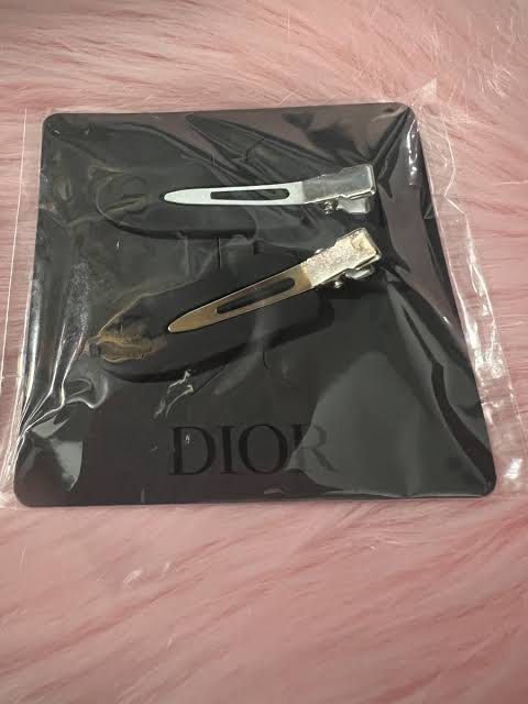 Dior hair clip (Category: Hair Accessories) located in Lucban. Submitted by amandabdel87777 (Listing ID 1460365967, Image 1). Description: 2 packs available on hand dior clip black .