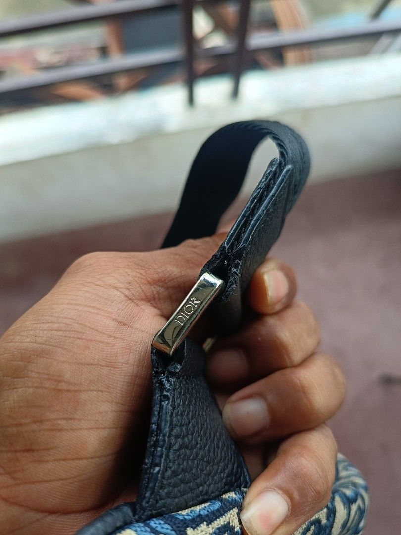 DIOR OBLIQUE SADDLE BAG BLACK IN CANVAS (Category: Luxury Bags & Wallets) located in Legazpi City. Submitted by paul-galvez420. (Listing ID 1460309944, Image 3). Description: DIOR OBLIQUE SADDLE BAG BLACK IN CANVAS GOOD AS NEW CONDITION NO ISSUE.