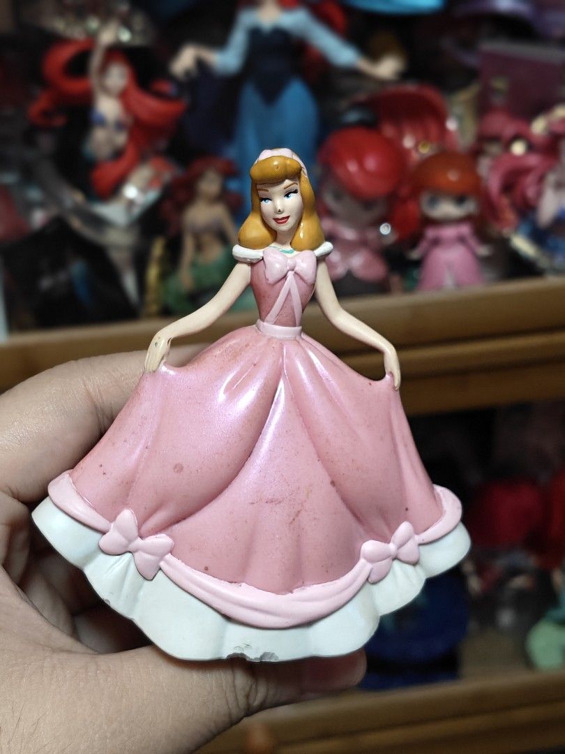 Disney Cinderella Figure (Category: Figurines & Statues) located in Angeles City. Submitted by treasure_trove14 (Listing ID 1460441115, Image 1). Description: cinderella in pink gown with flaws (see photos).