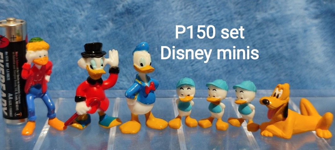 Disney Mickey Minnie Ducks Mini Figures Set (Category: Designer & Blind Box Toys) located in Baguio. Submitted by abigailmyra (Listing ID 1460335269, Image 2). Description: - Set 1: Mickey Mouse, Minnie Mouse, Donald Duck, Daisy Duck (P85) - Set 2: Scrooge McDuck, Donald Duck, Huey, Dewey, Louie, Pluto (P150) - Ideal for Disney collectors - Great as party favors -Super tiny loc:Baguio-CAR.