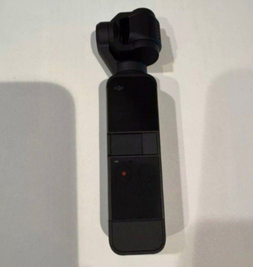 DJI OSMO POCKET 2 CAMCORDER GIMBAL, BLACK-COMPLETE SET (Category: Video Cameras) located in Quezon City. Submitted by stuffiesetc (Listing ID 1460379734, Image 2). Description: DJI OSMO POCKET 2 CAMCORDER GIMBAL,BLACK-COMPLETE SET Guaranteed authentic. used a few times for travel but still in excellent condition. no deep scratches, no functional defects. complete set in original box. package includes: 1 DJI osmo pocket 2 1 usb cable 3 connector a