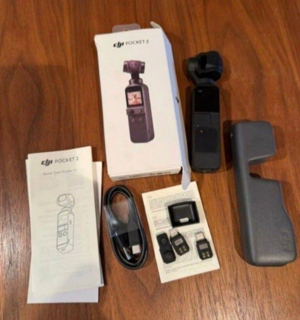 DJI OSMO POCKET 2 CAMCORDER GIMBAL, BLACK-COMPLETE SET (Category: Video Cameras) located in Quezon City. Submitted by stuffiesetc (Listing ID 1460379734, Image 1). Description: DJI OSMO POCKET 2 CAMCORDER GIMBAL,BLACK-COMPLETE SET Guaranteed authentic. used a few times for travel but still in excellent condition. no deep scratches, no functional defects. complete set in original box. package includes: 1 DJI osmo pocket 2 1 usb cable 3 connector a