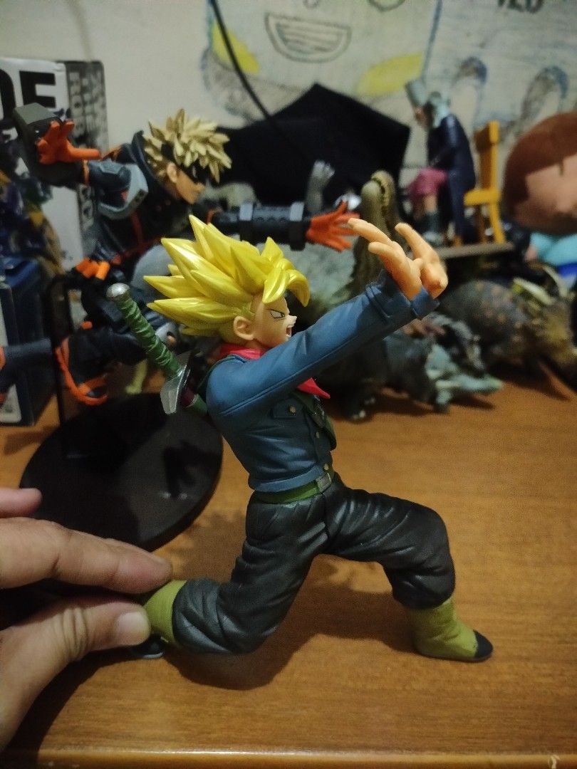 Dragon Ball Z Trunks Action Figure with Sword (Category: Figurines & Statues) located in Plaridel. Submitted by klayskolektibols (Listing ID 1460465375, Image 1). Description: - Dragon Ball Z Trunks Action Figure - Dynamic, action-ready pose - Includes signature sword accessory - Highly detailed craftsmanship - Essential for any Dragon Ball fan's collection.