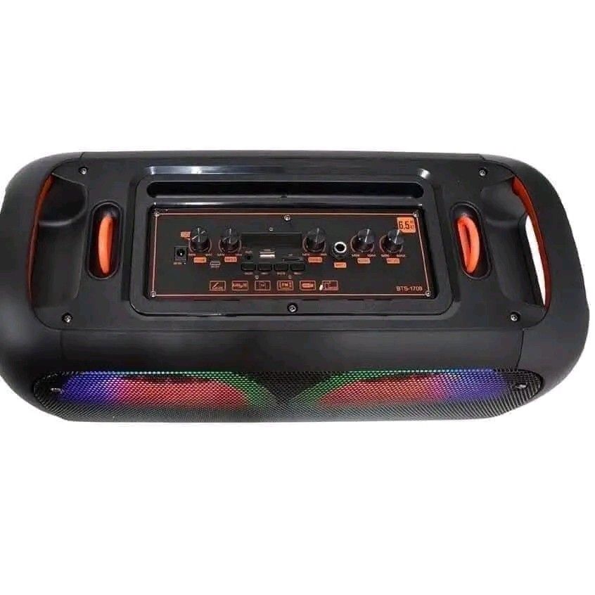 DYNAMIC BTS-1709 6.5 Inch Subwoofer Bluetooth Speaker with Lights (Category: Soundbars, Speakers & Amplifiers) located in Manila. Submitted by marvieobordo (Listing ID 1460442813, Image 3). Description: - Dynamic BTS-1709 6.5 inch Subwoofer Speaker - Bluetooth, USB, SD Card, FM Radio connectivity - Karaoke function with included microphone - Rechargeable battery for portable use - Vibrant colorful LED lights - Built-in phone holder - Ideal for pa