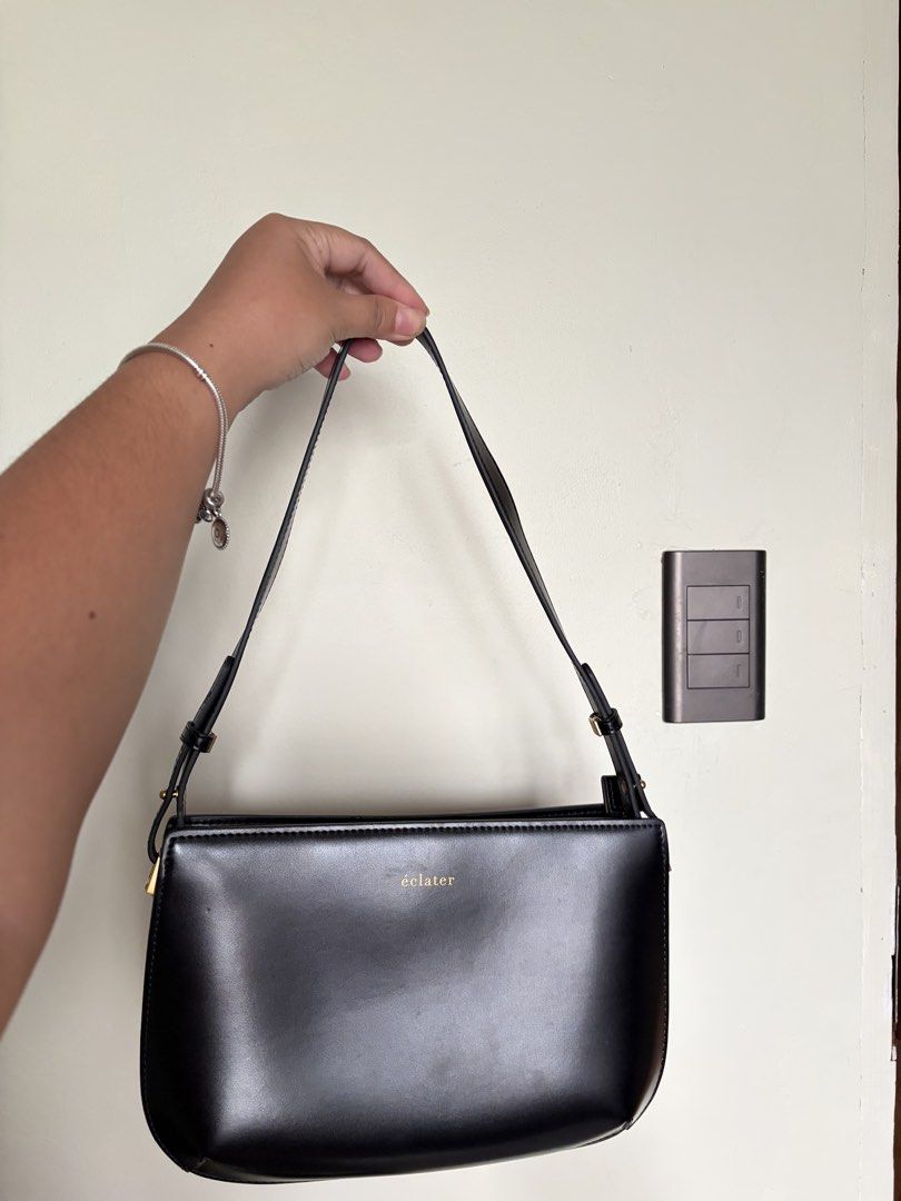 Eclater leather shoulder / sling bag in black (Category: Luxury Bags & Wallets) located in Carles. Submitted by stefunnnny (Listing ID 1460323658, Image 1). Description: Selling this bèaut. Used 2x only, and still looks new. No any issue. So so nice pa. Smooth finish leather and suede inside. Very high quality bag. Bought on their website for 7k+++. It comes with 2-removable strap. 1 shoulder strap 1 sling strap RFS: Natatambak lang siya..