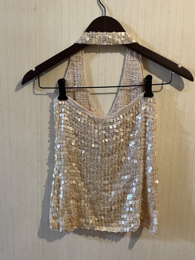 EGOIST Sequin Halter Top (Category: Sleeveless) located in Agoo. Submitted by omaethrift (Listing ID 1460330308, Image 2). Description: - Sparkly halter top from EGOIST - Features all-over sequins with a crochet-like knit - Ideal for nights out, special occasions, parties, or festivals - Catches the light beautifully for a glamorous look.