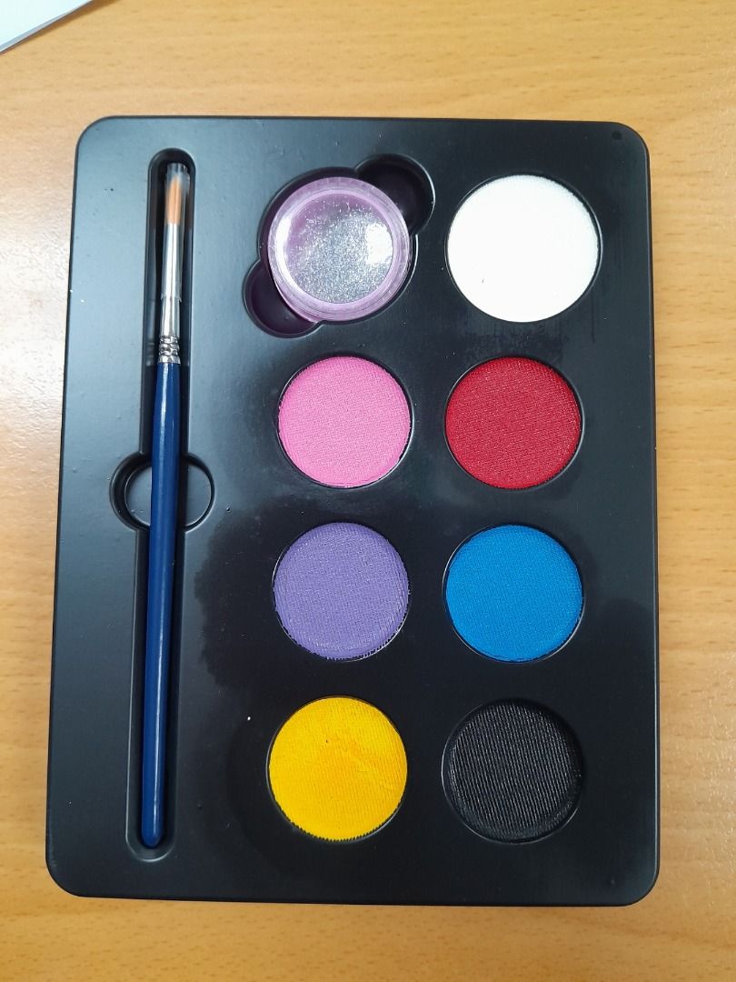 Face Paint Palette with Brush and Glitter (Category: Art & Prints) located in Manila. Submitted by bargaincentral2022 (Listing ID 1460366032, Image 3). Description: - Includes 8 vibrant face paint colors: white, pink, red, purple, blue, yellow, and black. - Comes with a bonus pot of glitter for extra sparkle. - A small brush is included for easy application. - Ideal for parties, costume events, or creative play. - User-friendly and blends smoothl