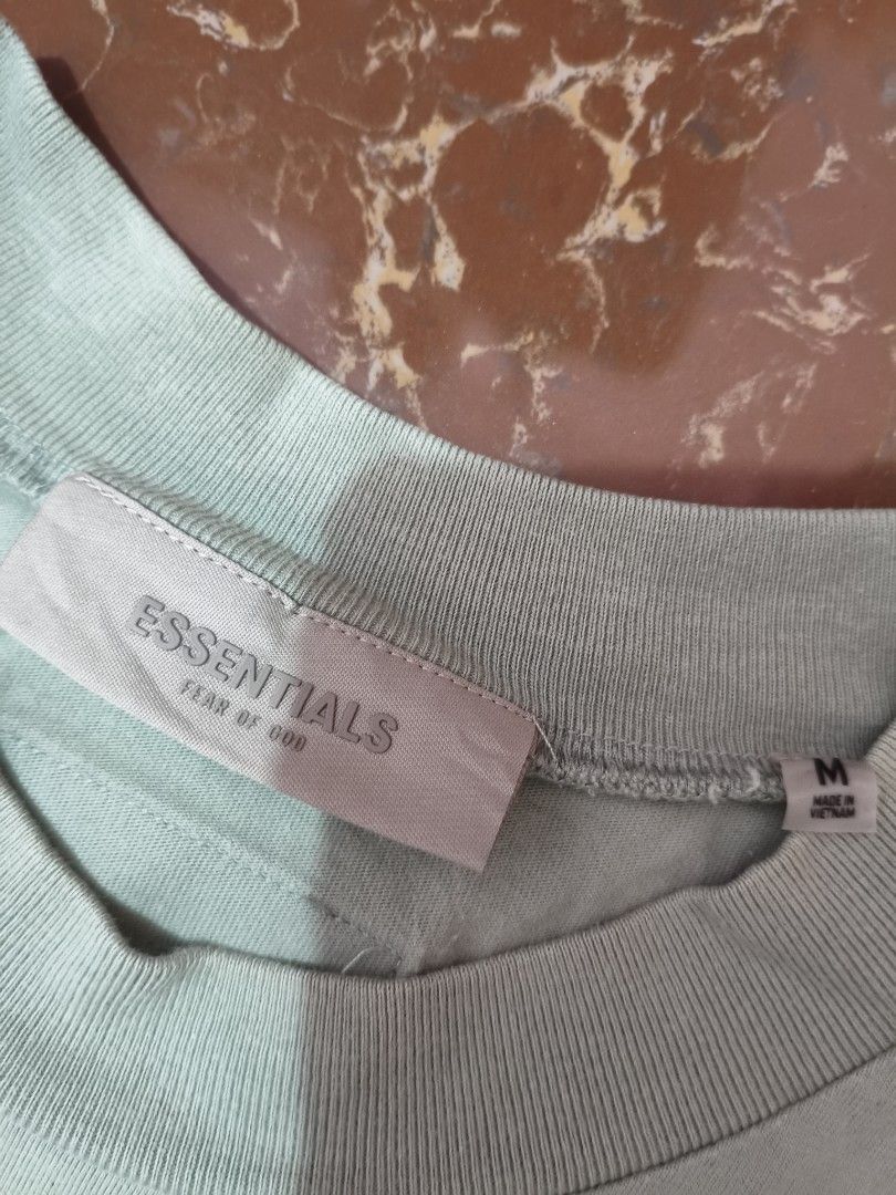 Fear of God Essentials Light Green (Category: Tshirts & Polo Shirts ) located in Paranaque City. Submitted by glendel_04 (Listing ID 1460322513, Image 2). Description: Good cond 9.5-9.8 Size XL .