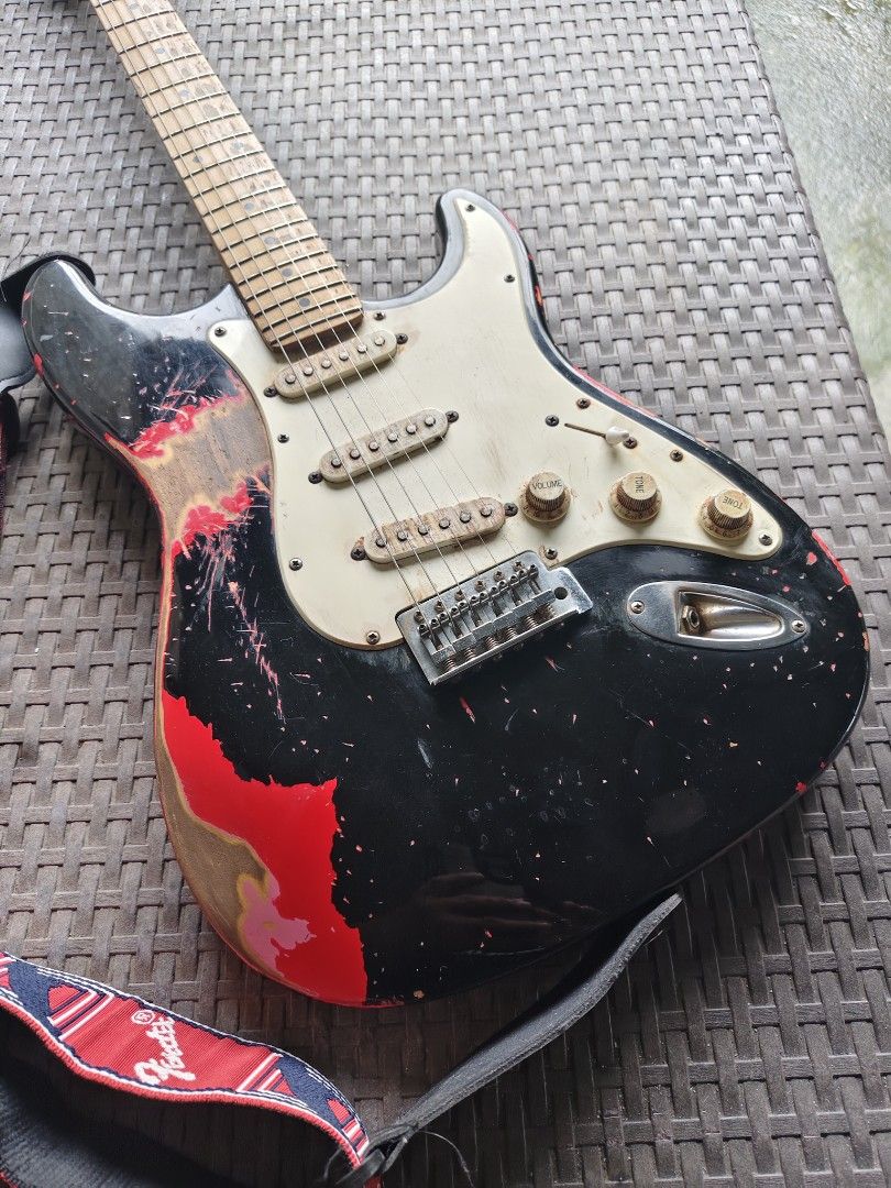 Fender Stratocaster Electric Guitar - Custom Relic (Copy only) (Category: Musical Instruments) located in Manila. Submitted by donsantiag93175 (Listing ID 1460380766, Image 2). Description: - Fender Stratocaster electric guitar copy - Alder body - Customized relic - Maple neck and fretboard - Comes with a Fender strap - Ideal for playing or as a display piece - Ready for a new home.