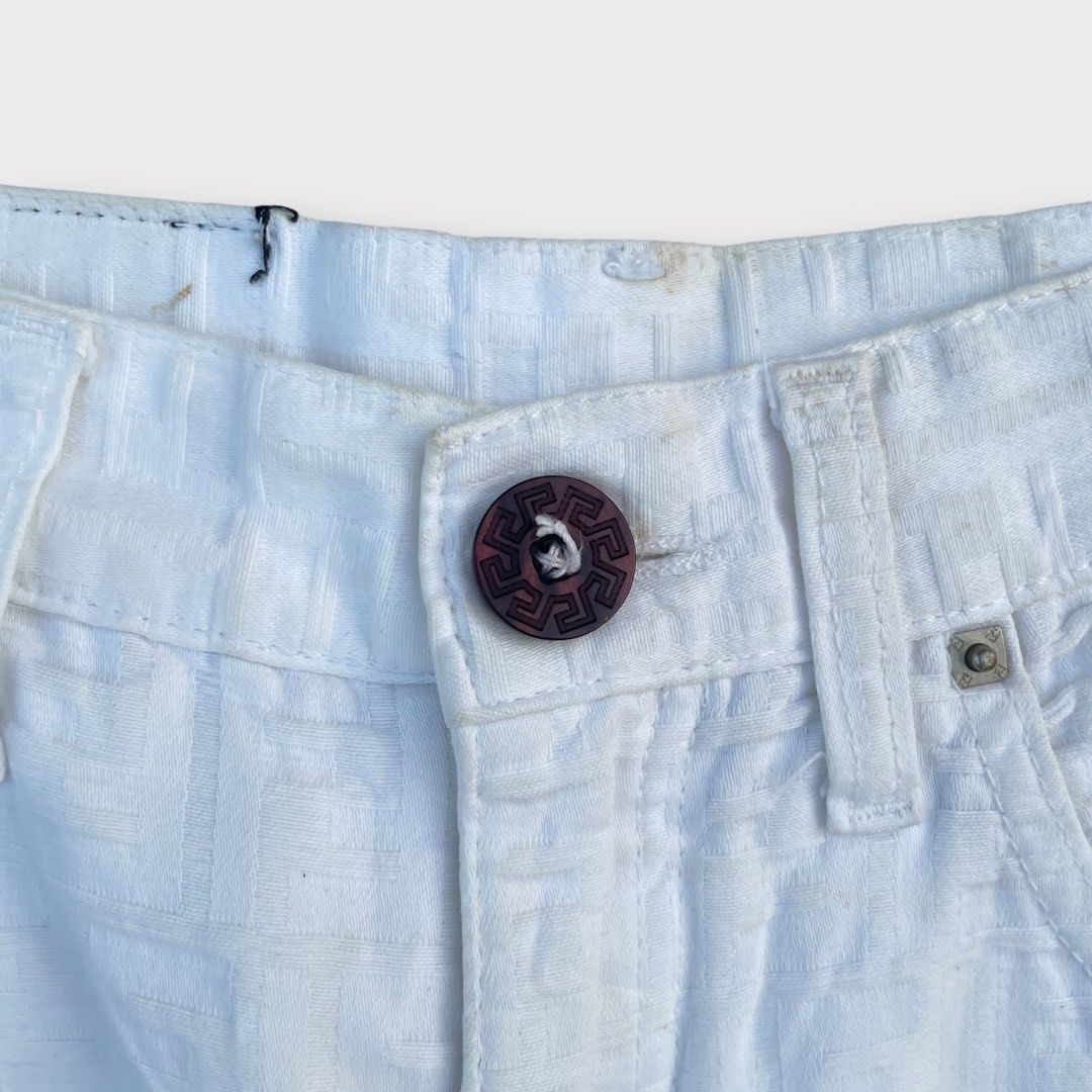 Fendi - Vintage FF Monogram Logo White Knit Pants (Category: Jeans) located in Los Banos. Submitted by declutterking (Listing ID 1460494009, Image 3). Description: Fits 26 waist • monogram FF logo • slim fit pants • minimal stains due to storage Dimensions: 13" waist 11.5" front rise 11" thigh 37.5" length 6.5" leg opening Used condition Authentic .
