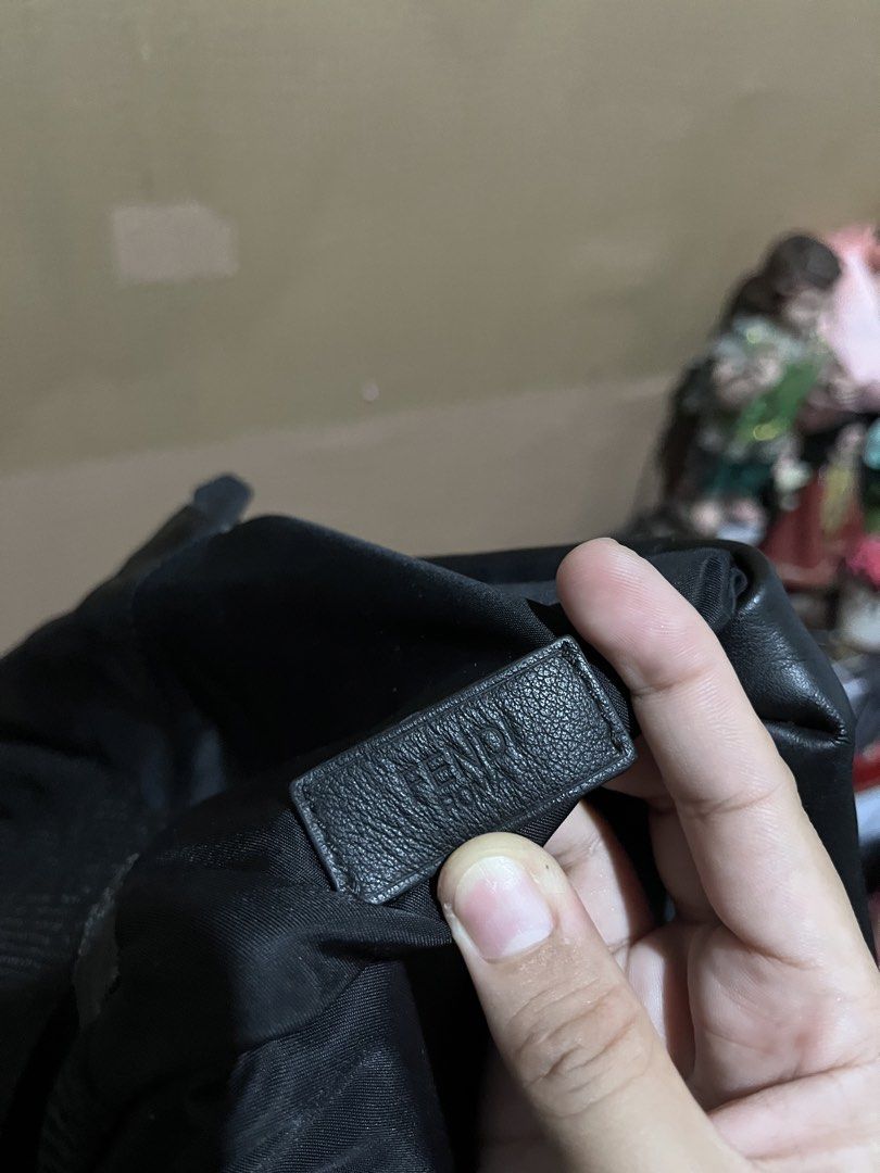 Fendi Monster Eyes Backpack Black Nylon Yellow Leather (Category: Luxury Bags & Wallets) located in Manila. Submitted by madecuratedwithlove11 (Listing ID 1460418840, Image 2). Description: - Fendi backpack -will send the issue via pm (rubs, minor sign of use in puller) - Black nylon material - Iconic Fendi monster eyes design with yellow leather and silver accents - Zipper closure - Interior Fendi Roma tag - Perfect for everyday use - Shows some