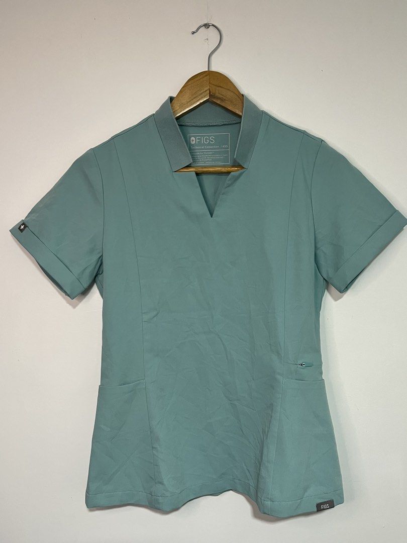 FIGS Technical Collection Scrubs Top XXS Teal (Category: Activewear) located in Dasmarinas. Submitted by thriftedbygii (Listing ID 1460308005, Image 1). Description: - FIGS Technical Collection top -Color: Teal -Fabric: 72% Polyester, 21% Rayon, 7% Spandex -Contrast Fabric: 65% Cotton, 29% Polyester, 6% Spandex -Made in Vietnam -Style #: W20SW1032 -POW #: 2914 - FREE SF NA PO.