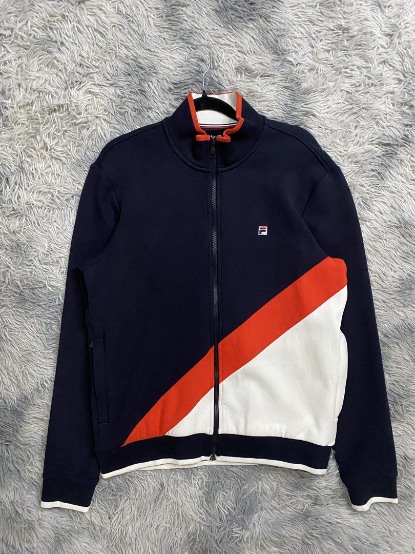 Fila Fullzip Jacket (Category: Coats, Jackets and Outerwear) located in Manila. Submitted by kurtmnla (Listing ID 1460473446, Image 1). Description: Fila Full zip jacket Size M fit/ Unisex Dimes 20x25 Good condition/ issue minimal dirt 📍Quezon city.