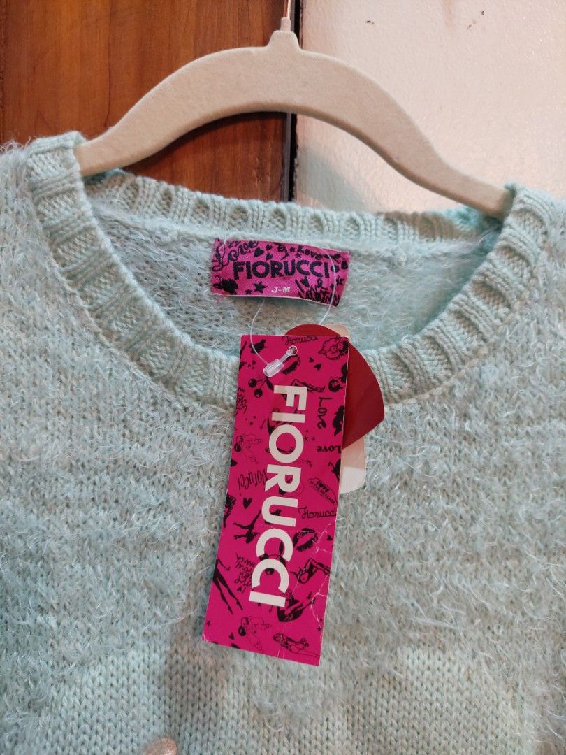 FIORUCCI Y2K EMBROIDERED KNIT SWEATER (Category: Others Tops) located in San Pedro. Submitted by cyanide.slug.cat (Listing ID 1460424172, Image 2). Description: bnwt small 36-40" bust 27" length.
