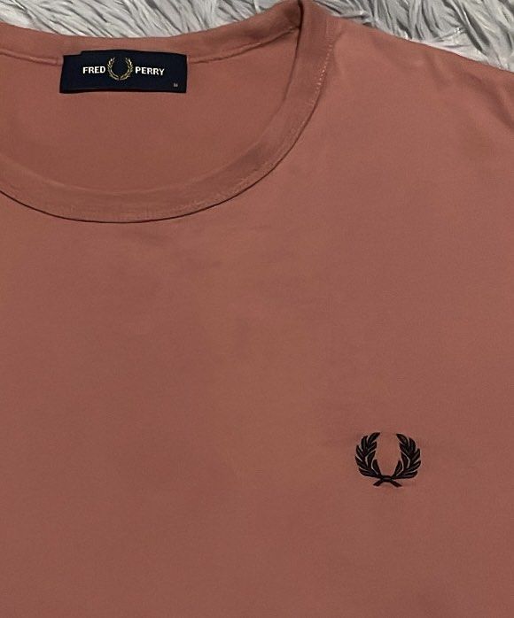 Fred Perry Putty Pink Ringer Shirt (Category: Tshirts & Polo Shirts ) located in Cebu City. Submitted by johnova18 (Listing ID 1460449126, Image 3). Description: Fred Perry Putty Pink Ringer Shirt Authentic ✅ Size: Medium Width: 20.5 Length: 28 Color rate: 10/10 Pristine condition Good As New 2800 + shipping fee Location: Cebu City.