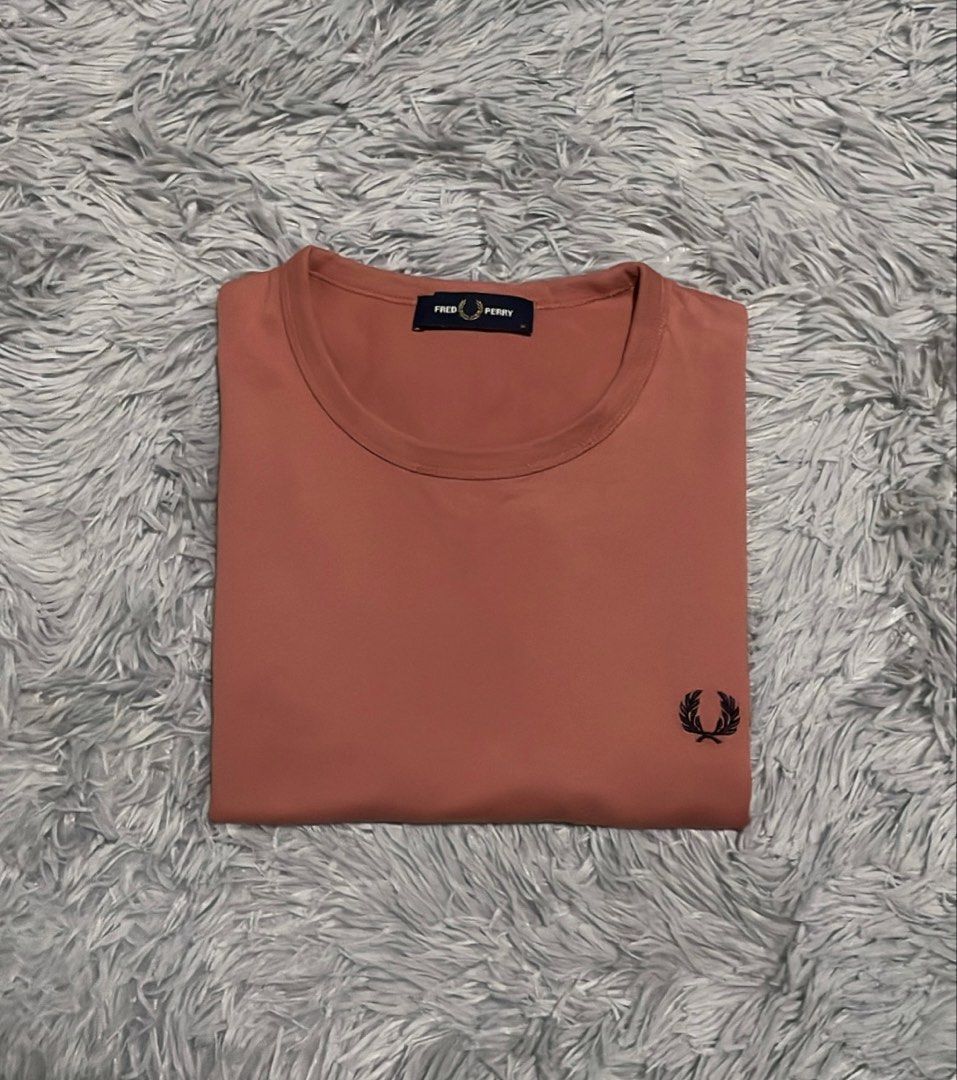 Fred Perry Putty Pink Ringer Shirt (Category: Tshirts & Polo Shirts ) located in Cebu City. Submitted by johnova18 (Listing ID 1460449126, Image 1). Description: Fred Perry Putty Pink Ringer Shirt Authentic ✅ Size: Medium Width: 20.5 Length: 28 Color rate: 10/10 Pristine condition Good As New 2800 + shipping fee Location: Cebu City.