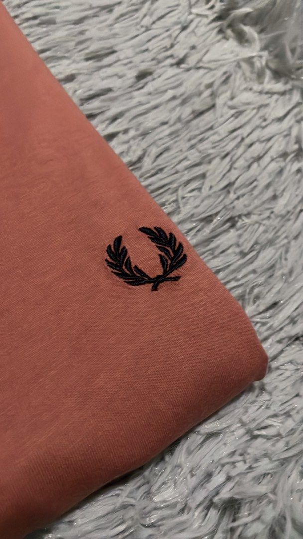 Fred Perry Putty Pink Ringer Shirt (Category: Tshirts & Polo Shirts ) located in Cebu City. Submitted by johnova18 (Listing ID 1460449126, Image 2). Description: Fred Perry Putty Pink Ringer Shirt Authentic ✅ Size: Medium Width: 20.5 Length: 28 Color rate: 10/10 Pristine condition Good As New 2800 + shipping fee Location: Cebu City.