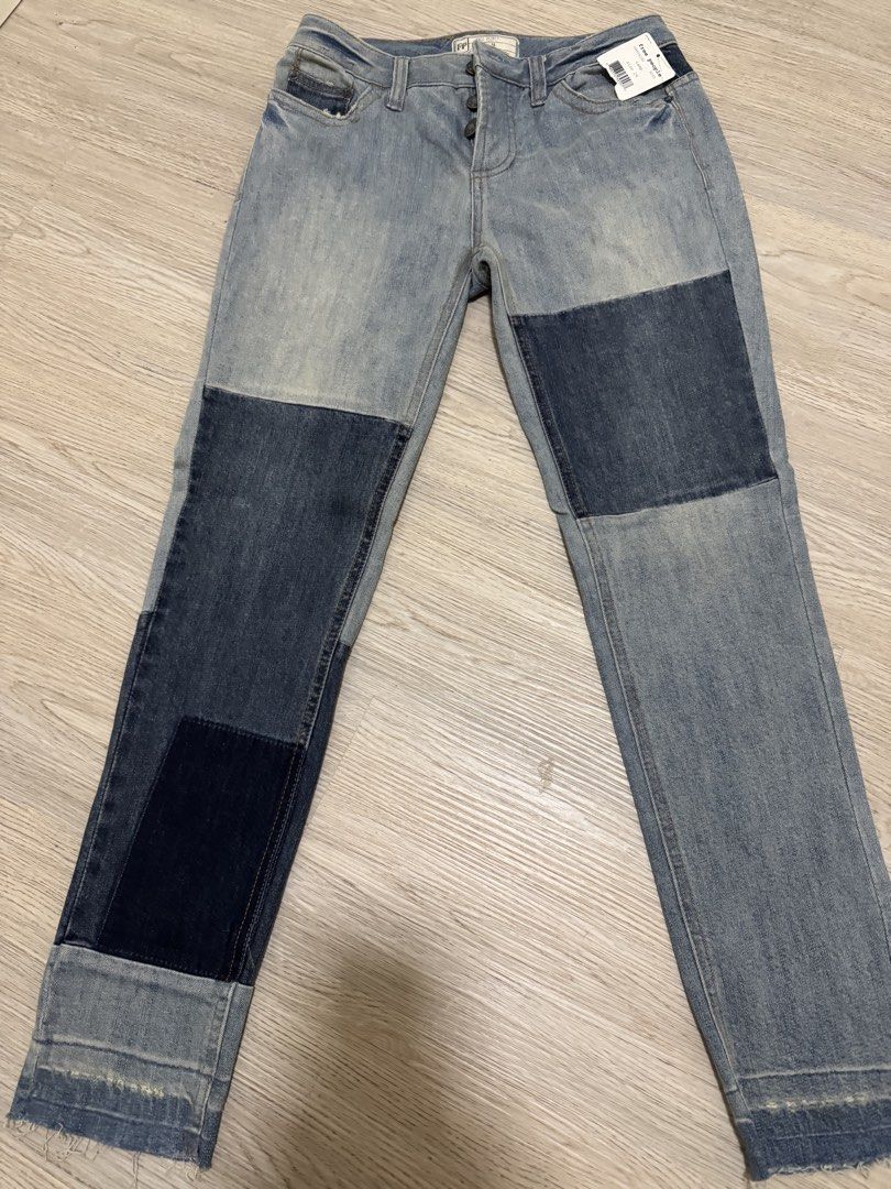 Free People Patchwork Denim Jeans Size 26 (Category: Jeans) located in Paranaque City. Submitted by cleverturtle.391c7c (Listing ID 1460326585, Image 2). Description: - Brand: Free People - Style: Patchwork Denim Jeans - Wash: Light blue with darker blue patches - Details: Raw hem, button fly closure - Size: 26 - Occasion: Casual.