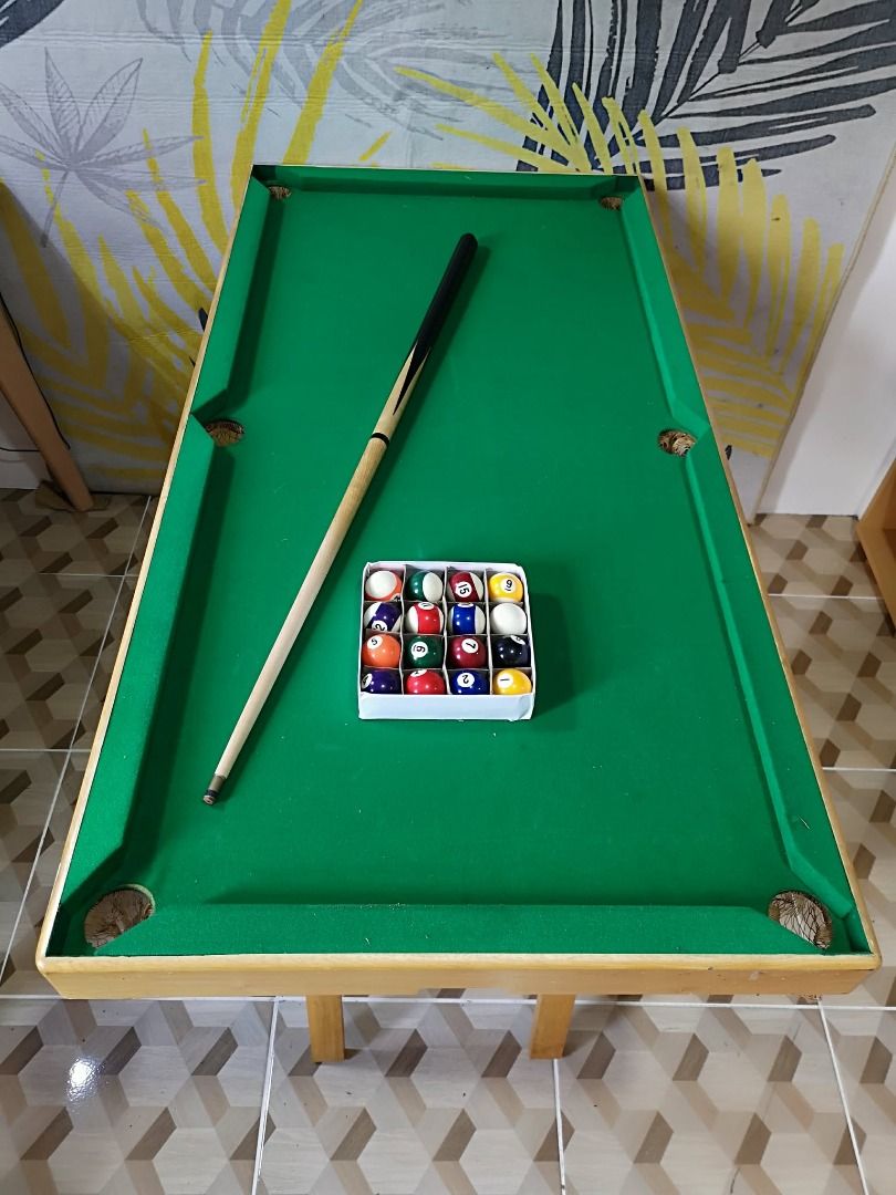 Freestanding Mini Wooden Billiard Table (Category: Billiards and Bowling) located in Santa Cruz. Submitted by jmy_surplus.2 (Listing ID 1460455469, Image 1). Description: Size ; L - 28 W - 48 H - 24 Color ; Green Type ; Billiard table Brand ; No brand Material ; Wood Style ; Green Felt Surface Billiard Table JMA JMY 5 Batch #218.