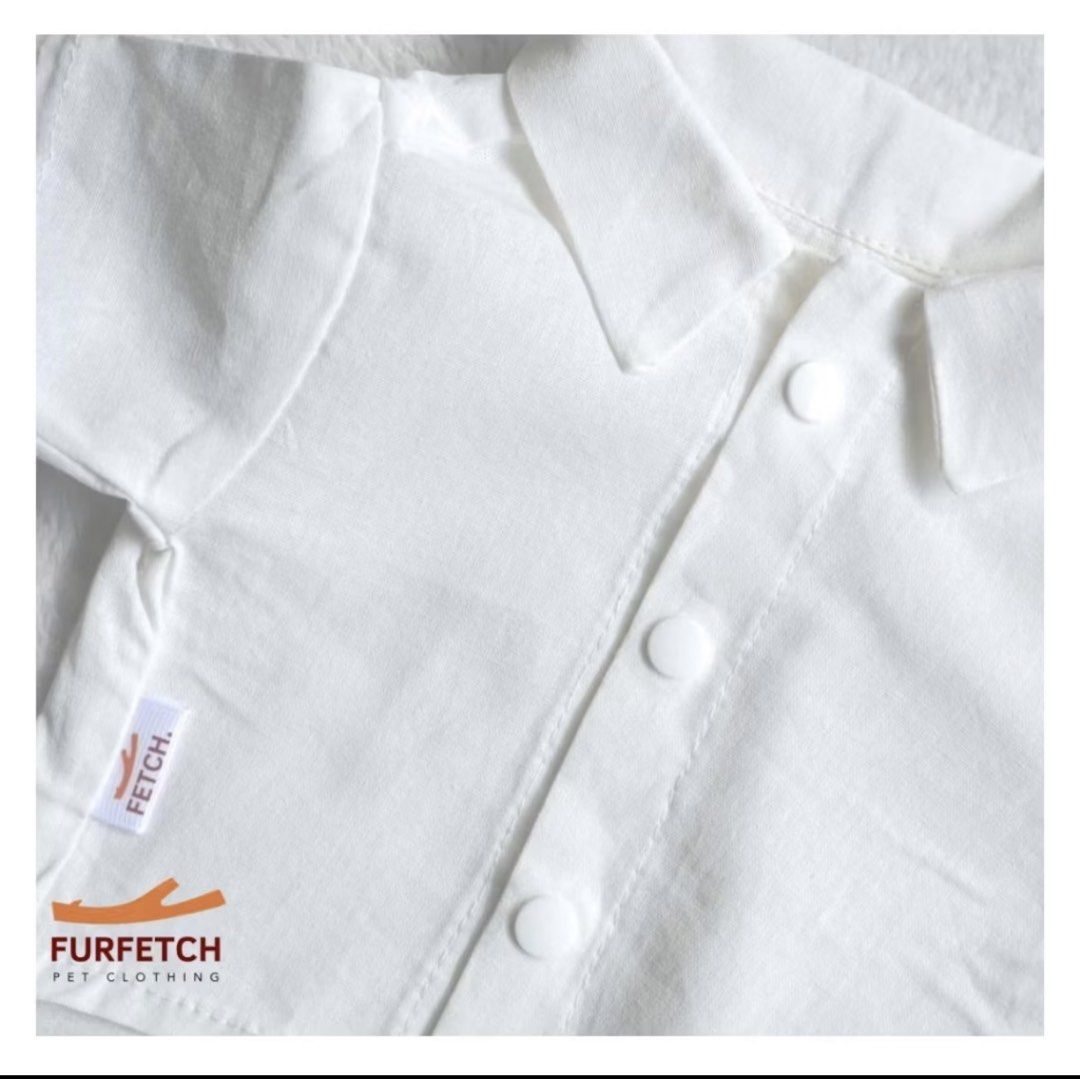 White Button-Up polo for Dogs (Category: Homes & Other Pet Accessories) located in Cainta. Submitted by p3spreloved (Listing ID 1460428365, Image 2). Description: - White button-up shirt for your pet - Brand: Furfetch Pet Clothing - Available in multiple sizes - Refer to size chart for measurements in cm - Ideal for special occasions or casual dress-up Size: 5XL Rfs: too small for my GR.