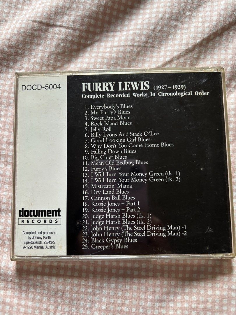Furry Lewis Complete Recorded Works In Chronological Order CD (Category: CDs & DVDs) located in Quezon City. Submitted by declutter_incorporated (Listing ID 1460326004, Image 2). Description: - Furry Lewis CD: Complete Recorded Works In Chronological Order (1927-1929) - Features 25 tracks from the legendary blues artist - Released by Document Records - Compiled and produced by John R.T. Davies - Essential collection for blues enthusiasts.