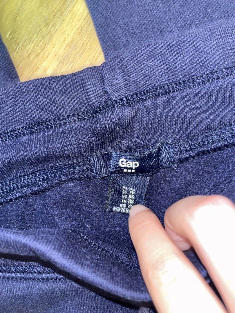 Gap Navy Blue Sweatpants Joggers Size XS (Category: Other Bottoms) located in Paranaque City. Submitted by kalattt (Listing ID 1460401615, Image 2). Description: - Navy blue sweatpants from Gap - Drawstring waist - Gap logo on the left leg - Size XS - Small mark on the left leg (please check photos) - Ideal for lounging or casual wear.