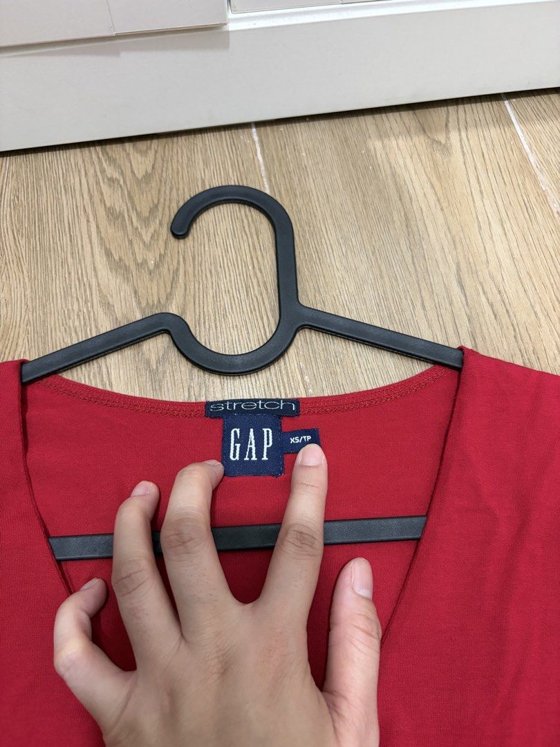 GAP Red V-Neck Stretch Top XS (Category: Sleeveless) located in Cavite. Submitted by kapekapekape (Listing ID 1460367993, Image 2). Description: - GAP Red V-neck Top - Comfortable stretch blend fabric - Three-quarter sleeves - Essential basic piece, easy to style - Measurements provided in photos Mode of Payment: Bank Transfer Shipping: J&T or Lalamove care of buyer.