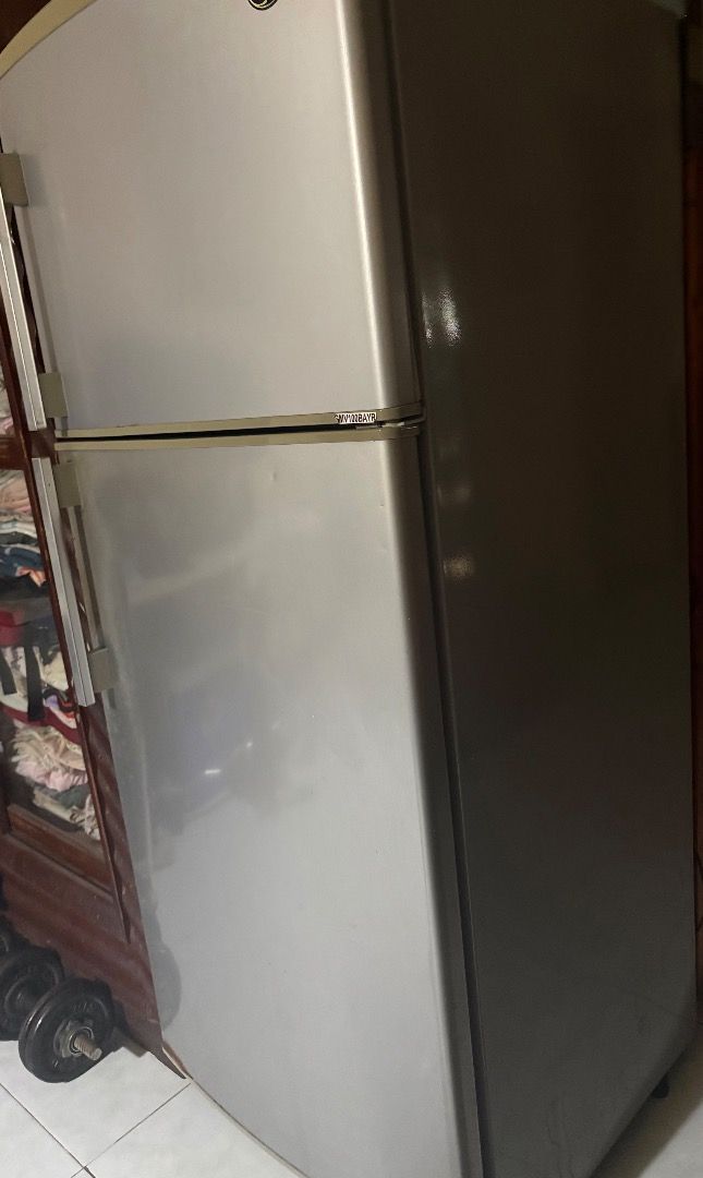 GE Refrigerator GMV100 BAYR (Category: Refrigerators and Freezers) located in Manila. Submitted by prettyjane08112 (Listing ID 1460396643, Image 3). Description: - GE Refrigerator Model: GMV100 BAYR.AG - Total Capacity: 201 Liters - Fresh Food Storage: 154 Liters - Freezer Storage: 47 Liters - Exterior Color: Silver - Freezer Type: Top Freezer - Origin: Made in Thailand - Features: Multiple shelves in fridge section - Condition Note: Some dust vi