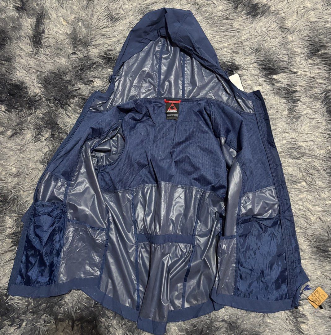 GERRY (Category: Coats, Jackets and Outerwear) located in Legazpi City. Submitted by thesource052 (Listing ID 1460491133, Image 3). Description: GERRY ( WOMENS ) GORETEX / WATERPROOF HEAVY RAIN. MEDIUM ON TAG Width: 20” Length:26” Good as new With hangtags. $41.99 No cracks 880.