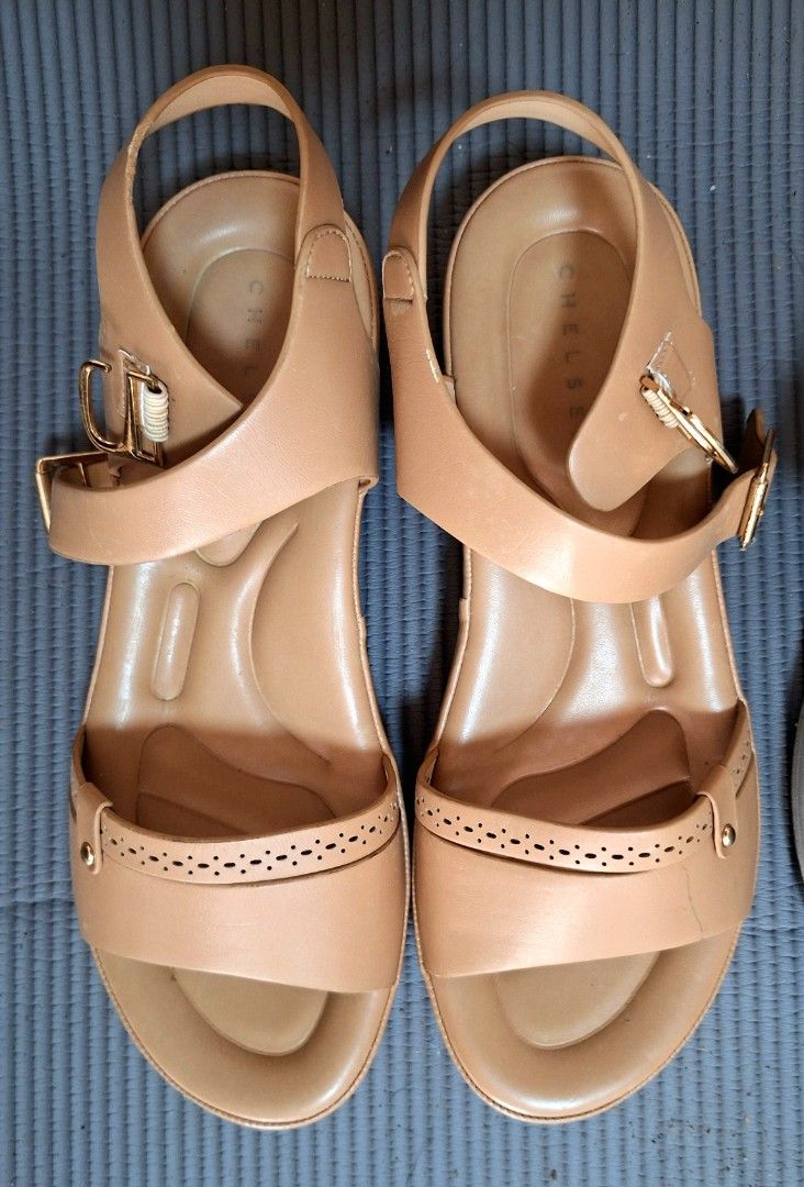 Gibi & Chelsea Comfort Sandals (Category: Flats & Sandals) located in Quezon City. Submitted by tinylittlecorner (Listing ID 1460333112, Image 3). Description: Comfortable sandals for everyday wear. -Gibi sandals are blue with velcro straps size 39 -Chelsea sandals is tan with buckle straps and perforated details size 40 Both are my moms and have cushioned insoles for extra comfort. Great for walking or casual outings, madaling bagayan. P1800 eac