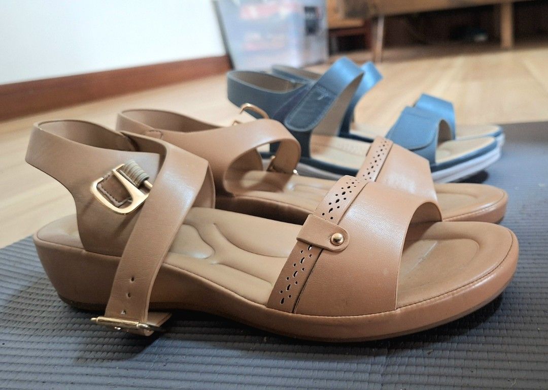 Gibi & Chelsea Comfort Sandals (Category: Flats & Sandals) located in Quezon City. Submitted by tinylittlecorner (Listing ID 1460333112, Image 2). Description: Comfortable sandals for everyday wear. -Gibi sandals are blue with velcro straps size 39 -Chelsea sandals is tan with buckle straps and perforated details size 40 Both are my moms and have cushioned insoles for extra comfort. Great for walking or casual outings, madaling bagayan. P1800 eac