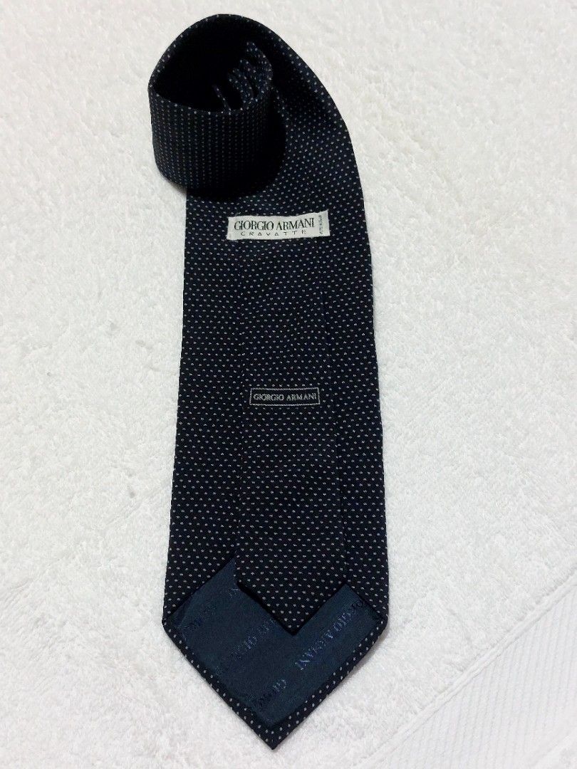 Giorgio Armani Necktie (Category: Luxury Accessories) located in Muntinlupa City. Submitted by sakurambo_des (Listing ID 1460476837, Image 1). Description: Giorgio Armani Cravatte Necktie Made in Italy 100%Silk fabric Color:Classic black background with a white micro-dot pattern. in very good condition..
