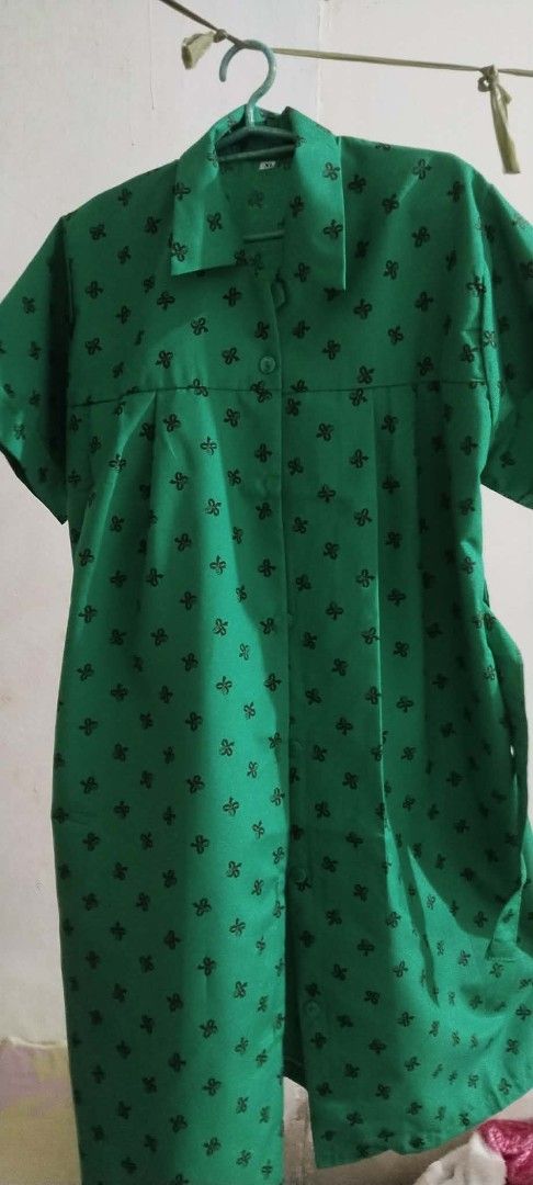 Girl Scouting uniform - Size XL (Category: Dresses) located in Makati City. Submitted by marizelsclosetdeclutter (Listing ID 1460305469, Image 3). Description: - Adorable green dress with a charming black bow print all over. - Features short sleeves and a classic collared neckline. - Includes a matching belt to beautifully cinch your waist. - Convenient button-up front for easy wear. - Size XL, ideal for a comfortable and stylish fit. - Perfect f