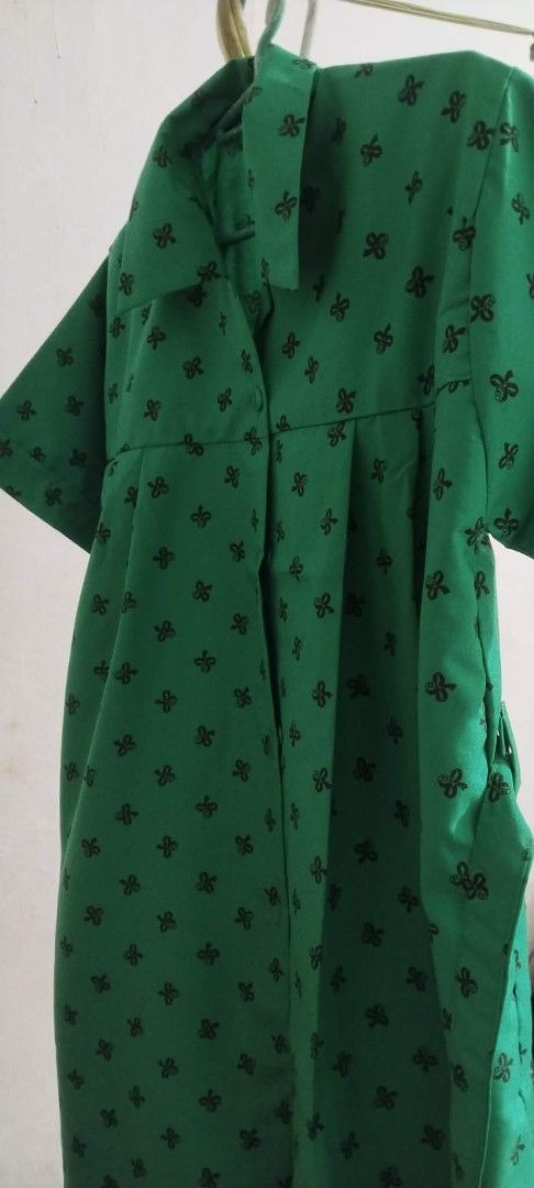 Girl Scouting uniform - Size XL (Category: Dresses) located in Makati City. Submitted by marizelsclosetdeclutter (Listing ID 1460305469, Image 1). Description: - Adorable green dress with a charming black bow print all over. - Features short sleeves and a classic collared neckline. - Includes a matching belt to beautifully cinch your waist. - Convenient button-up front for easy wear. - Size XL, ideal for a comfortable and stylish fit. - Perfect f