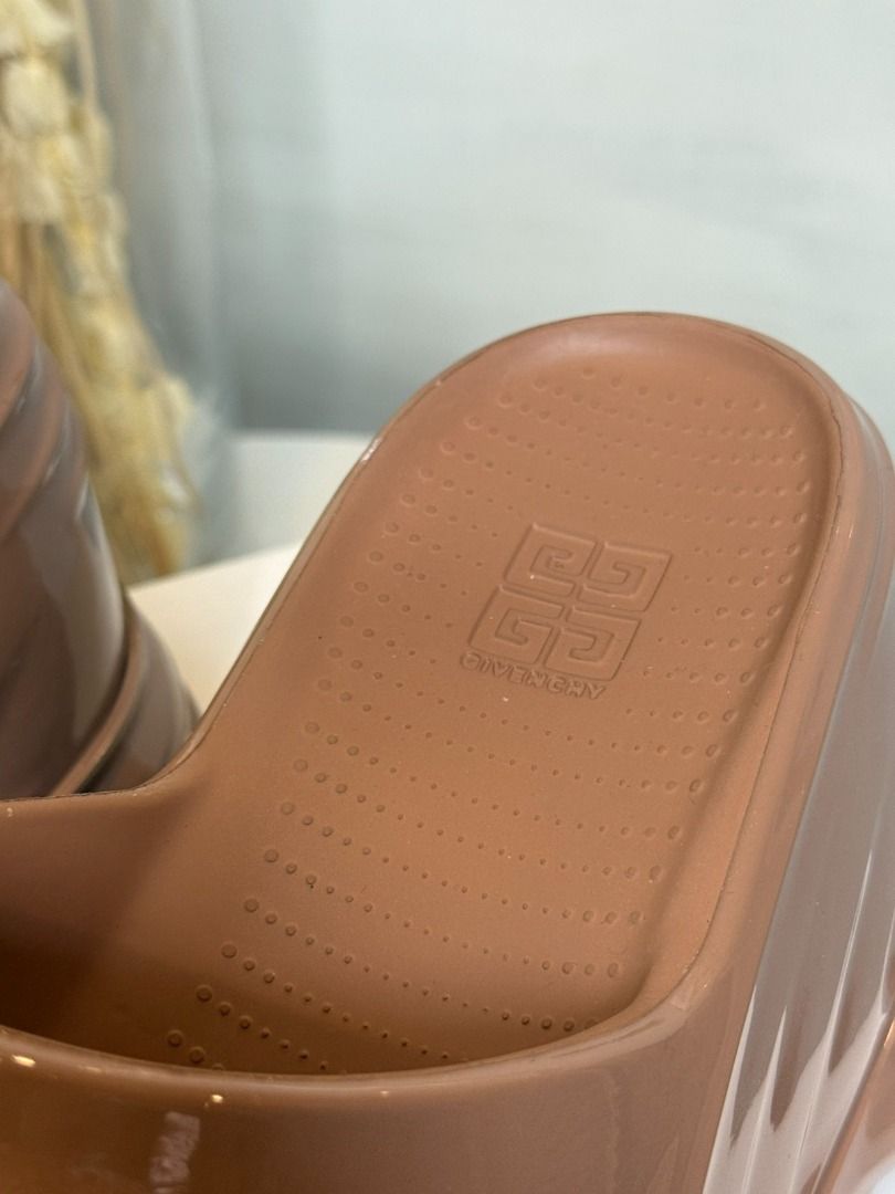 Givenchy Beige Patent Leather Wedge Slides (Category: Sneakers & Footwear) located in Las Pinas. Submitted by happystar_cac724 (Listing ID 1460396311, Image 3). Description: Givenchy marshmallow sandals size 40 Original Price Php 40,500 sale price 16k Brand new.