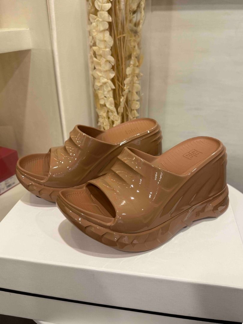 Givenchy Beige Patent Leather Wedge Slides (Category: Sneakers & Footwear) located in Las Pinas. Submitted by happystar_cac724 (Listing ID 1460396311, Image 2). Description: Givenchy marshmallow sandals size 40 Original Price Php 40,500 sale price 16k Brand new.