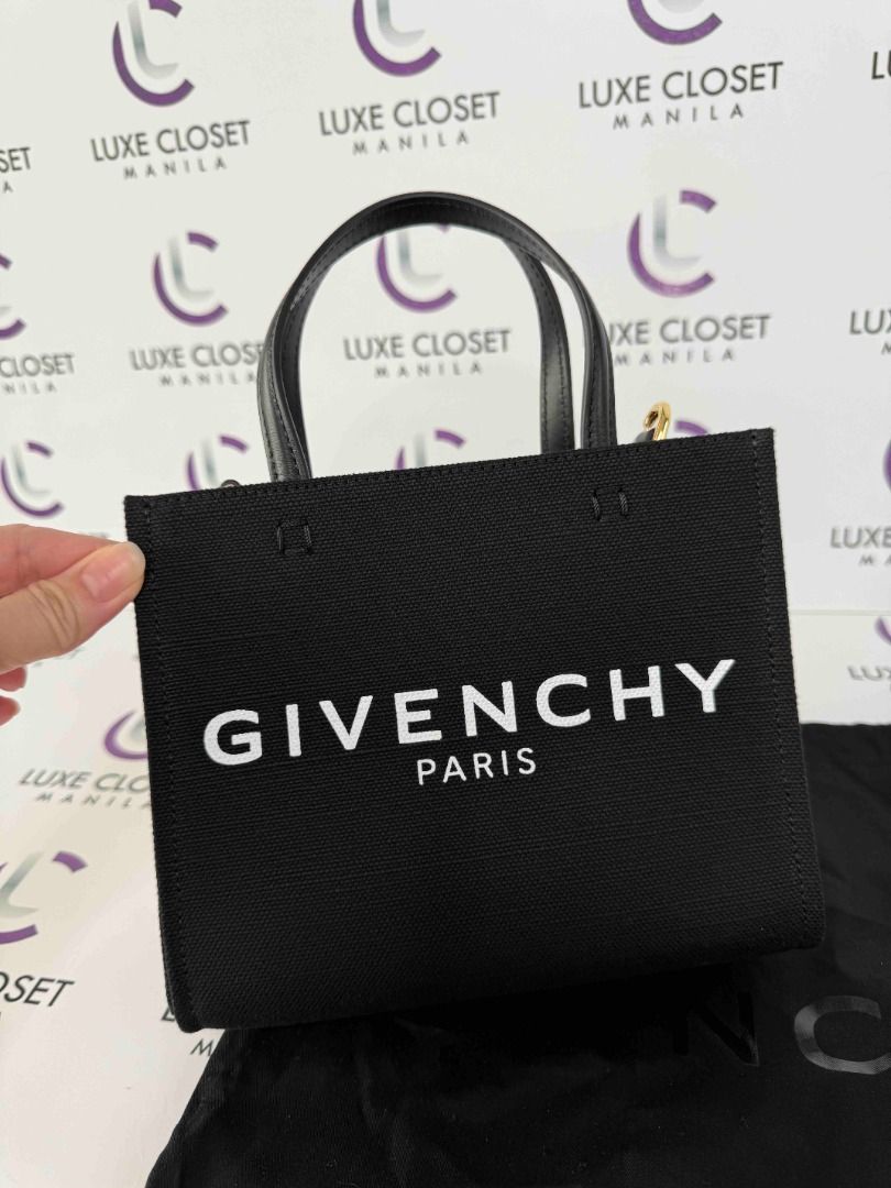 Givenchy Paris Black Canvas Mini Tote Bag (Category: Luxury Bags & Wallets) located in Las Pinas. Submitted by happystar_cac724 (Listing ID 1460377051, Image 1). Description: Givenchy mini tote bag Php 35k only Brand new comes with strap and dustbag.