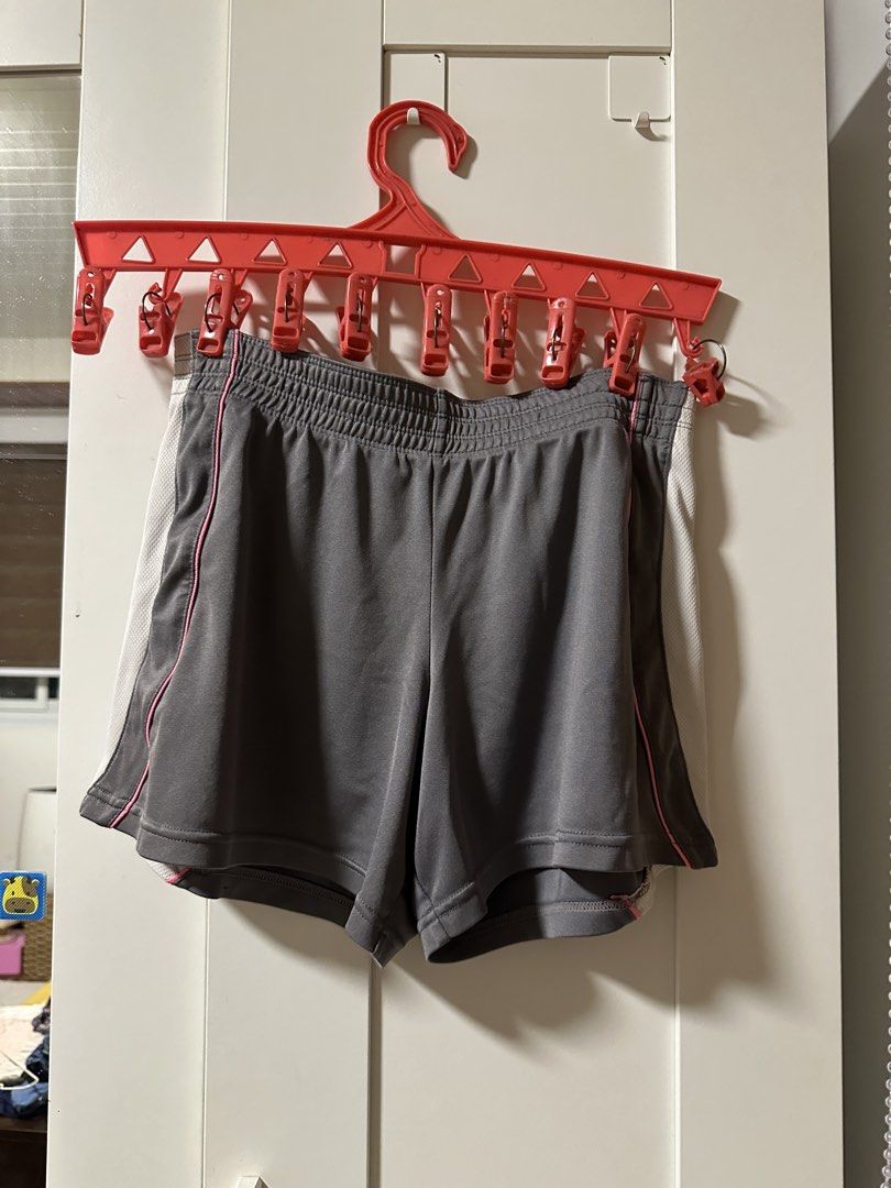 Grey Athletic Shorts with Pink Trim (Category: Shorts) located in Malolos. Submitted by fituccine (Listing ID 1460420352, Image 1). Description: - Grey athletic shorts - White side panels with pink trim - Elastic waistband for a comfortable fit - Lightweight material - Ideal for running and workouts.
