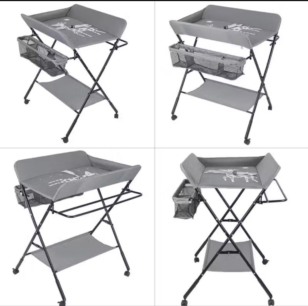 Changing table (Category: Changing Tables & Stations) located in Singapore. Submitted by toblessaway (Listing ID 1460469081, Image 2). Description: - Grey baby changing table - Padded top with cute giraffe design - Side mesh storage pockets - Lower storage shelf - Folds for easy storage - Wheels for convenient mobility - Dimensions available in the last photo.