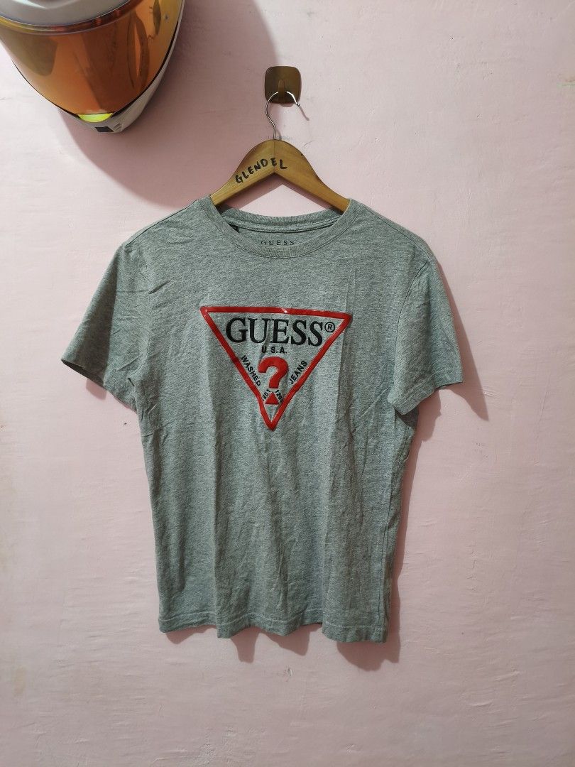 Grey Guess USA T-shirt (Category: Tshirts & Polo Shirts ) located in Paranaque City. Submitted by glendel_04 (Listing ID 1460329065, Image 1). Description: Excellent cond Med Laundry ✅.