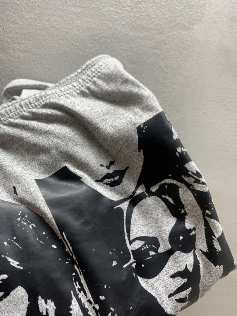 Grey Off-Shoulder Long Sleeve Top with Print (Category: Longsleeves) located in Manila. Submitted by fheiiyou (Listing ID 1460483229, Image 2). Description: - Grey long sleeve top - Off-shoulder neckline - Black and white collage print of faces on front - Soft and stretchy fabric - Snug, flattering fit - Perfect for an edgy, casual style.