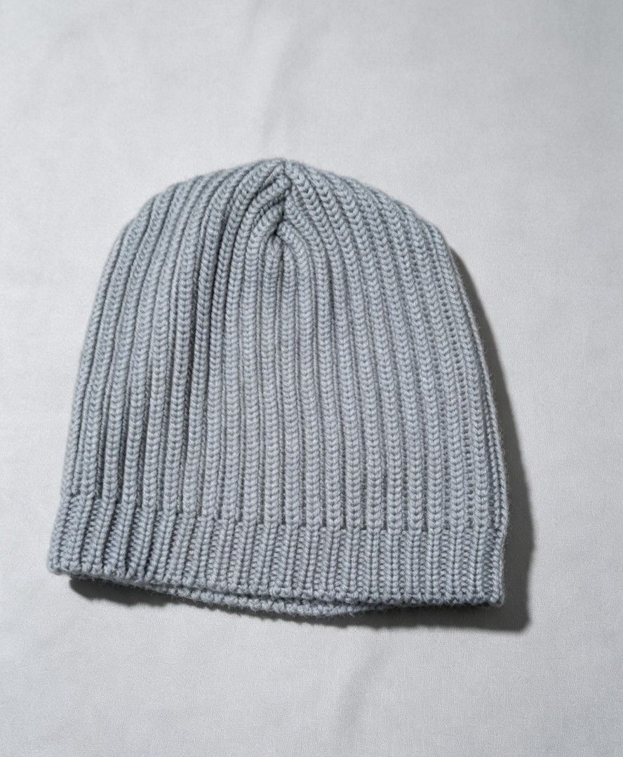 Grey Ribbed Knit Beanie Hat (Category: Hats & Beanies) located in Malabon City. Submitted by cyberthrifter85824 (Listing ID 1460250336, Image 2). Description: - Simple grey beanie - Ribbed knit texture for warmth and coziness - Classic, easy-to-style shape - Ideal for keeping warm on cold days.