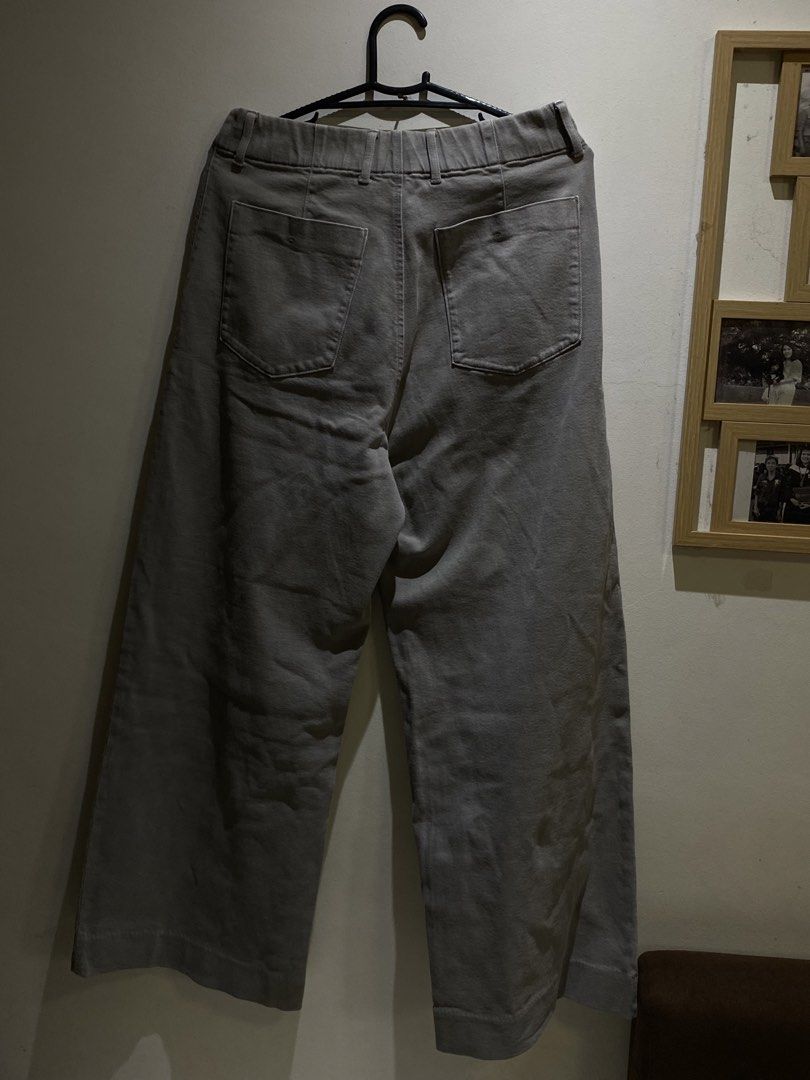 Grey Wide Leg Pants Size 12 (Category: Other Bottoms) located in Manila. Submitted by muchiii808 (Listing ID 1460489858, Image 3). Description: - Grey wide leg pants - Sturdy cotton blend fabric - Elasticated waistband at the back - Two side pockets - Two back pockets - Ideal for casual wear - Easy to style.