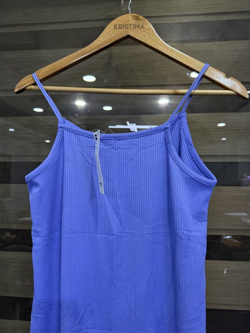 Gu ribbed dress (Category: Dresses) located in Manila. Submitted by kristinata44809 (Listing ID 1460326240, Image 2). Description: - Brand: GU (Uniqlo) - Type: Ribbed spaghetti strap dress - Color: Purple - Size: S (EU 36/UK 8/US 4) - Material: Ribbed fabric for comfort and stretch - Style: Casual, versatile, perfect for layering - Condition: New with tags (implied by label).