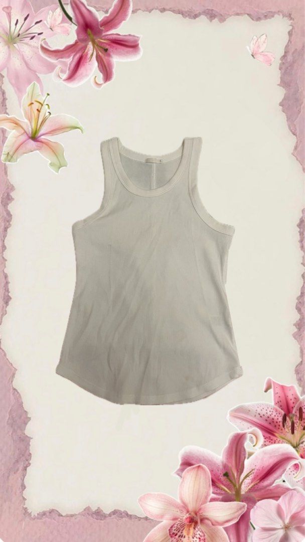 GU White Ribbed Tank Top (Category: Sleeveless) located in Quezon City. Submitted by fashionistastyles (Listing ID 1460379673, Image 1). Description: - Small, Never been worn - Perfect Condition - Bought from Japan - Comment “Mine” or Send a message 💌 .
