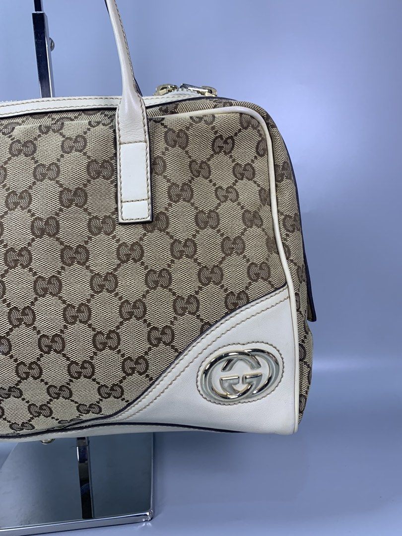 Gucci Canvas Britt Shoulder Bag (Category: Luxury Bags & Wallets) located in Mabalacat. Submitted by vtgmalan (Listing ID 1460316737, Image 3). Description: Gucci Canvas Britt Shoulder Bag Price: 18,000 Condition :9/10 Product Condition Rank :AB Issue/s : Sign of usage Dimensions :14x9x3.5(LxHxW) Inclusions: N/A Note : Please make sure to check all the photos before mine. All of the Items on sale are LEGIT/ORIGINAL. If you have a question , pleas